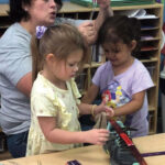 Young-children-measuring-with-different-tools