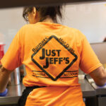 Back-of-bright-orange-shirt-for-Just-Jeffs