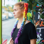 Model-with-rainbow-texture-braids-front-view