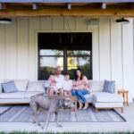 Family-on-porch-sofa-doggo