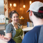 Talking-to-Amanda-rainey-behind-the-counter-at-Goldies