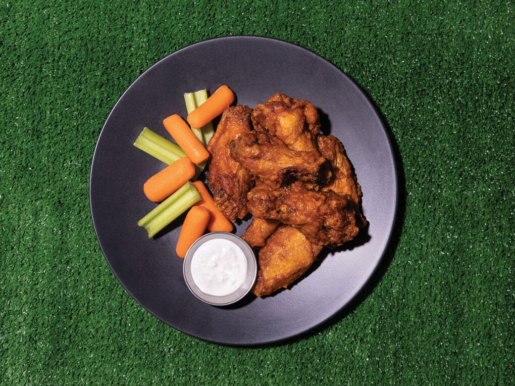 CJ's Hot Wings w/ bleu cheese dressing, celery, & carrots