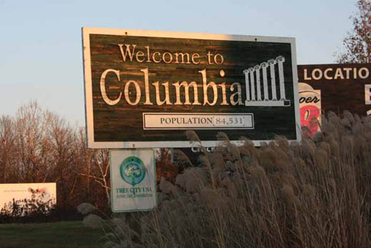 The current Columbia welcome sign on eastbound Interstate 70 displays a decade-old population estimate.