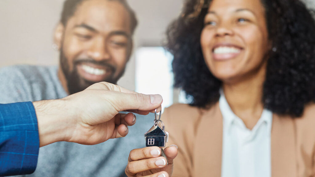 Black Couple Getting Keys to New Home
