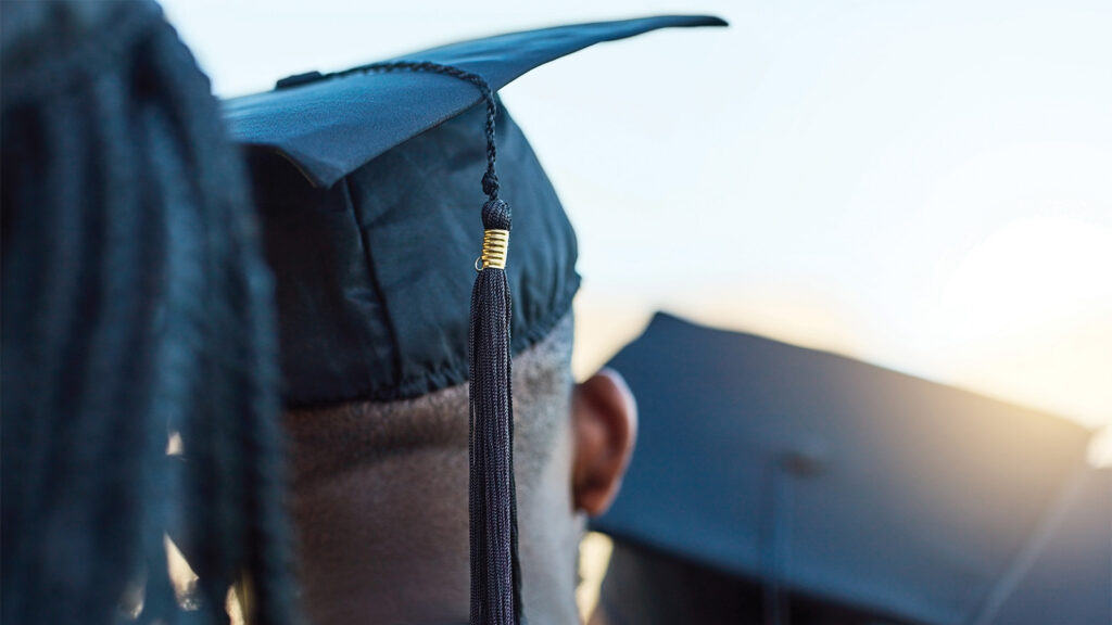 Student wearing a graduation cap at commencement