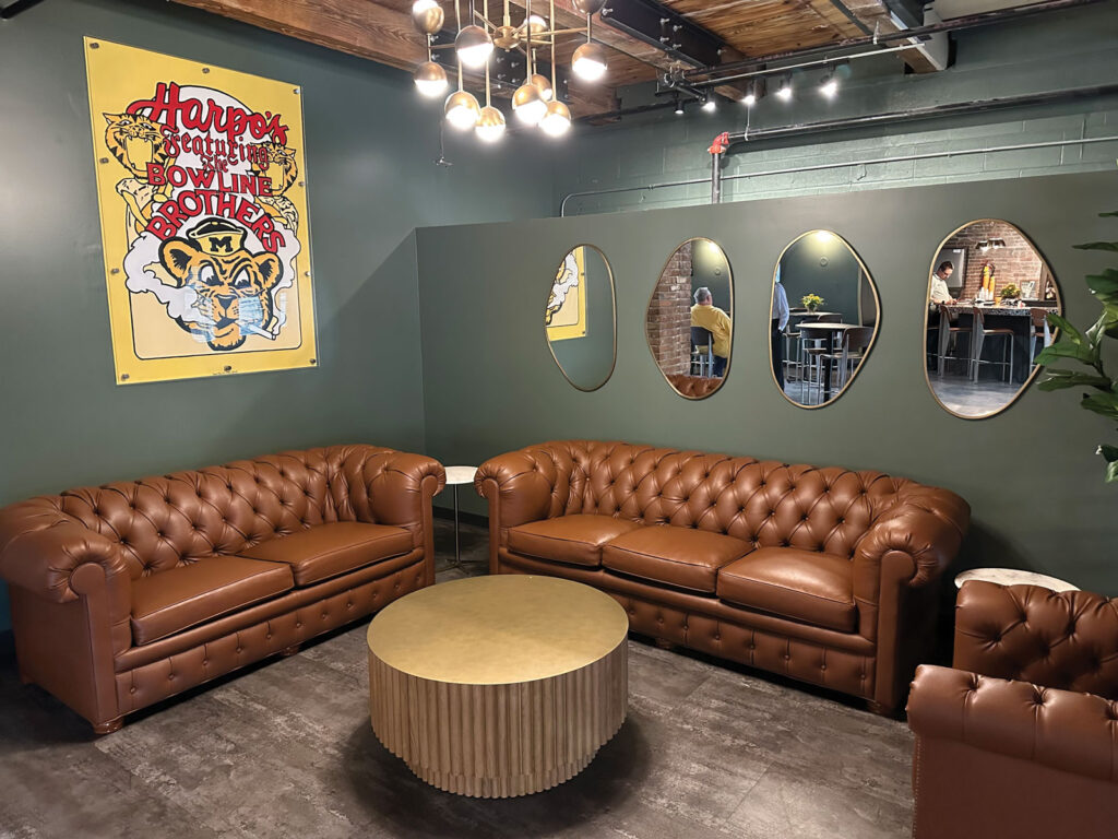 The Landing: Seating area with leather couches