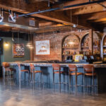 Interior Shot Of A Sports Bar With A Warm And Rustic Feel