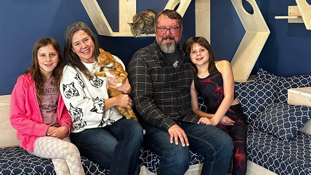 Owners of Berthas Beans and Lizzi and Roccos Pose with Cats in New Space