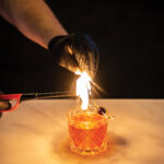 Six-Mile Ordinary Bourbon Old Fashioned showing flamed orange swatch