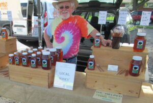 Steve Moeller of Lone Cottonwood Farms at his spot at the Columbia Farmers marker. Photo courtesy of Columbia Farmers Market