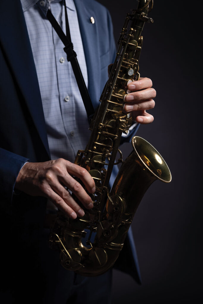 Ed Scavone close up playing saxophone