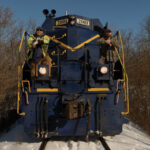 Featured Colt Railroad Operators Matthew Sabath And James Day Stand On The Train Exterior