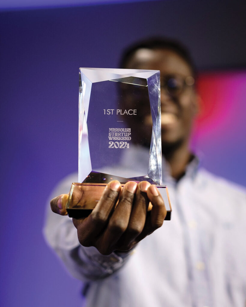 Missouri Startup Weekend 2024 Winner Holding First Place Trophy