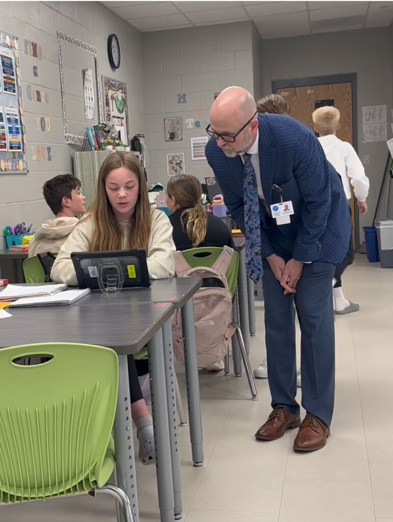 Dr Jeff Klein Cps Superintendent Listening To A Student