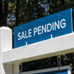 Featured Sale Pending Sign Outside Of Property