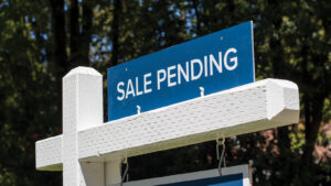 Featured Sale Pending Sign Outside Of Property