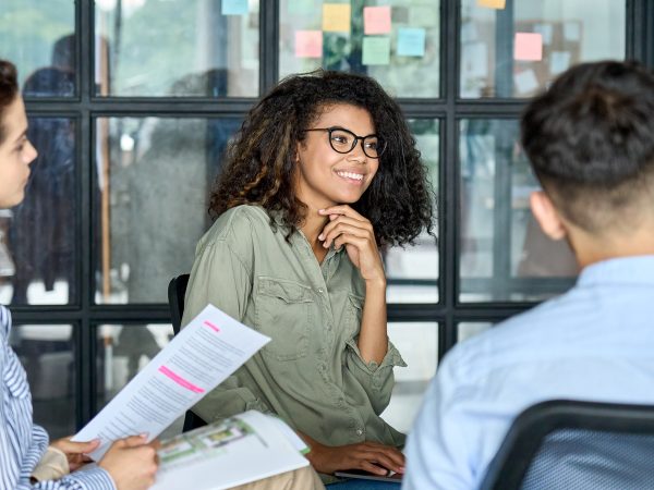 Featured Happy Employee In A Collaborative Workplace