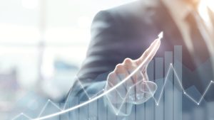 business-graph showing growth and a line going up as the graph continues