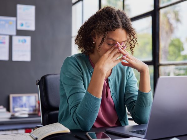 featured-young-professional-burntout-at-desk