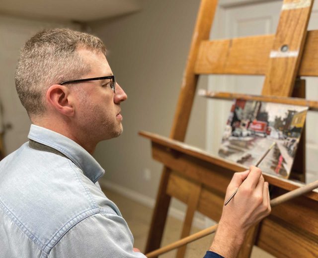 Derek-B-Fox-painting-at-his-easel