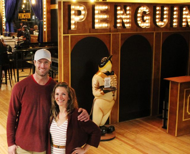 Gia and Rob Reade in front of the Penguin restaurant and piano bar in downtown Columbia, Missouri.