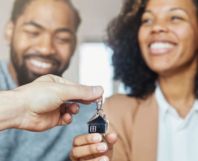 Black Couple Getting Keys to New Home
