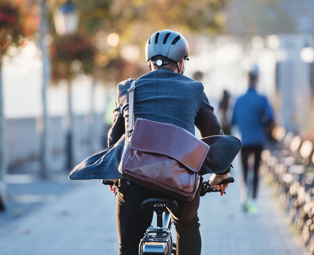 Featured Businessman Commuting On A Bike