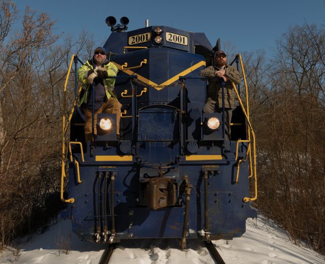 Featured Colt Railroad Operators Matthew Sabath And James Day Stand On The Train Exterior