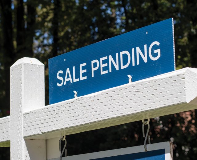 Featured Sale Pending Sign Outside Of Property