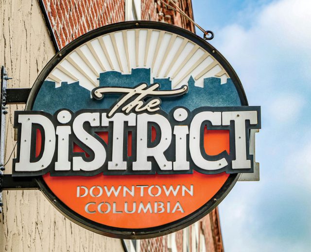 Featured The District Signage In Downtown Columbia Missouri