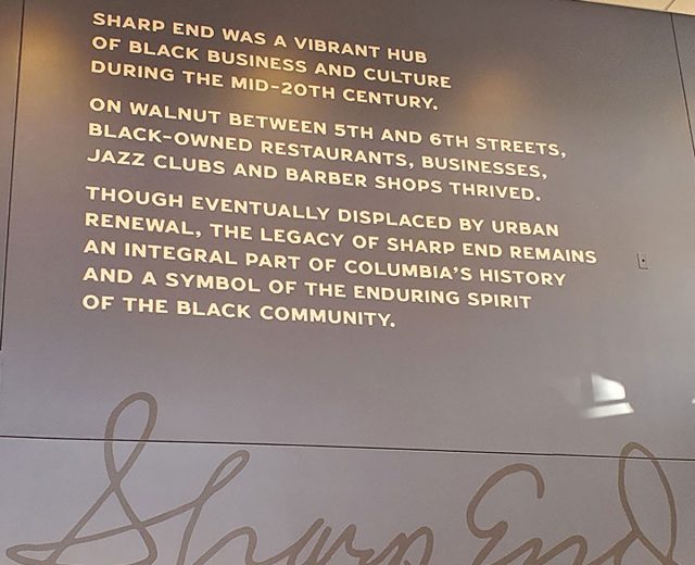 The north wall at The Shops at Sharp End features the story of the Sharp End, Columbia's historically Black business district that was destroyed and displaced by urban renewal in the 1950s and early 1960s.